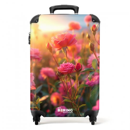 Roze rozen bij zonsondergang.