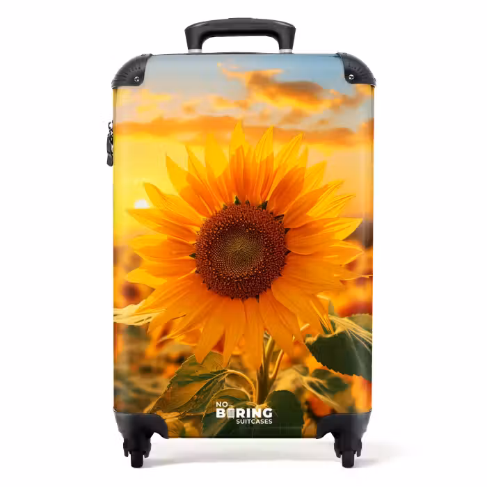 Koffer - Gele zonnebloem bij zonsondergang