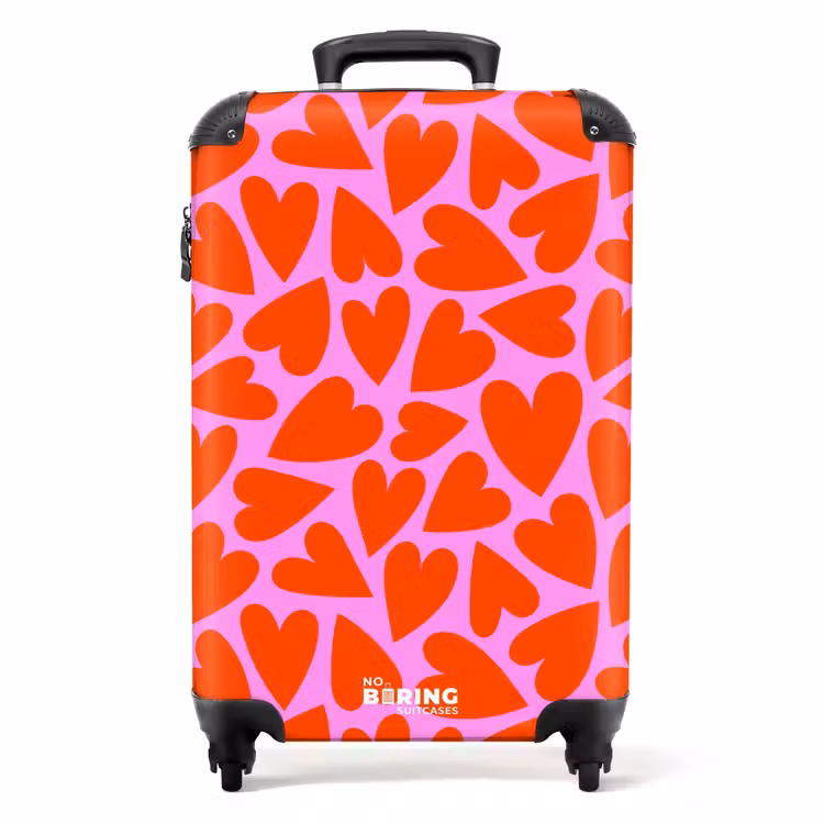 Koffer - Dicht patroon van rode harten op roze achtergrond — 1